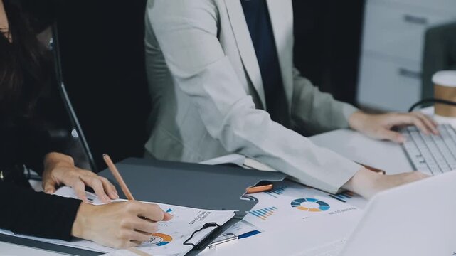 Businessman and Certified Public Accountant (CPA) auditor providing accounting and auditing services in the same company and stock market chart data and anti bribery of accounting