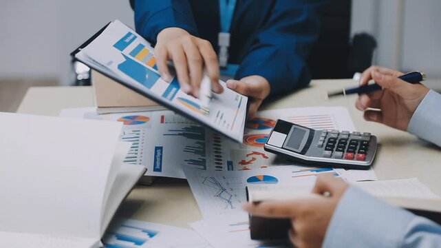 Businessman and Certified Public Accountant (CPA) auditor providing accounting and auditing services in the same company and stock market chart data and anti bribery of accounting