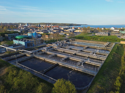 Danish wastewater treatment plant featuring multiple filtration basins, processing tanks and interconnected purification systems