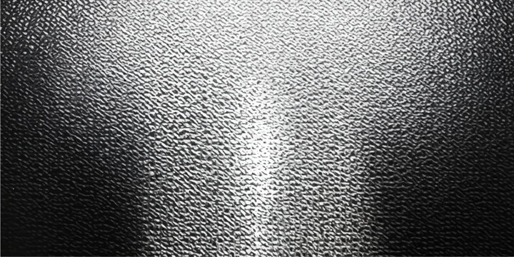 A dark silver brushed metal surface with wet rain drops creates a textured metallic aluminum background featuring a macro liquid pattern