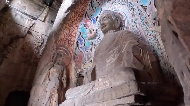 Ancient Buddha Statue Inside Ornate Cave Temple