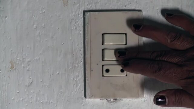 Senior Citizen Hand Operating An Old Fashioned Light Switch In Argentina - 4K