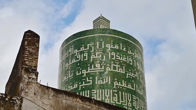 Unique green minaret of the Sentissi Mosque in Moulay Idriss Zerhoun
