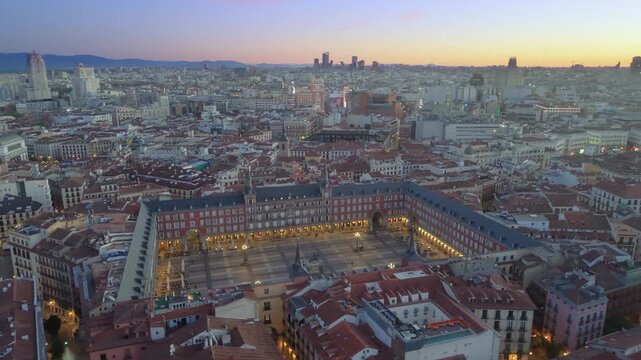 Aerial view of Plaza Mayor At Madrid. Spain. Medieval Buildings Landscape. Downtown District. Madrid At Community Of Madrid Spain. 