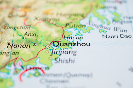 Macro photograph of Quanzhou and Jinjiang area map in Fujian province with coastal features and transport lines.
