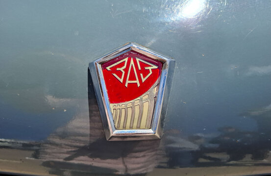 VORONEZH, Russia - April 25, 2026.Close up of the red and chrome ZAZ emblem on a vintage Soviet automobile from the late 20th century