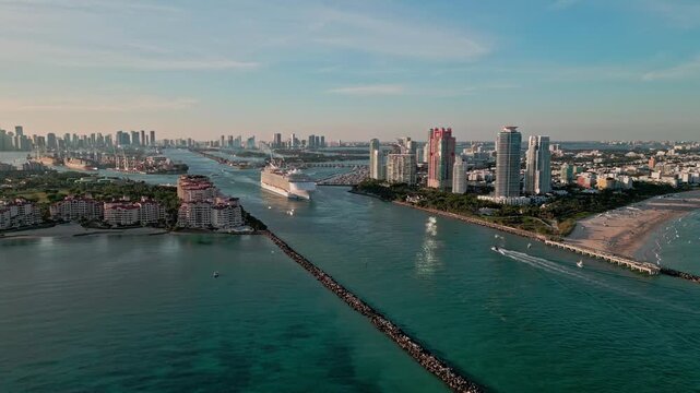 Aerial view Cruise ship sailing next to Miami South Beach. . cruise ship sailing near South Beach. Cruise liner sailing from Miami harbor. Cruise vacation