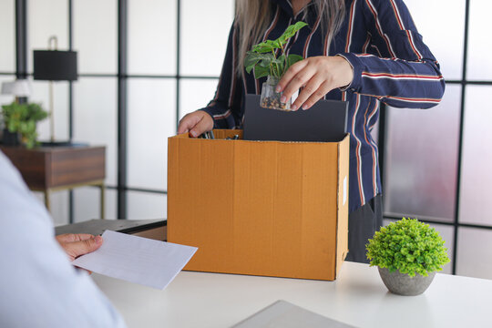Manager Terminating Employee and Handing Over Severance Document.