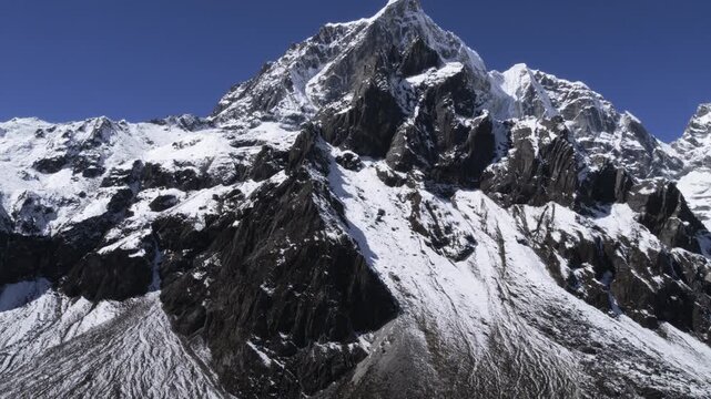 Cholatse Peak: Majestic Himalayan Summit with Jagged Rock and Snow, Nepal