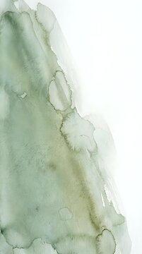 Abstract watercolor wash in soft green tones with organic flowing shapes and delicate paint bleeding effects on white paper background for artistic projects.