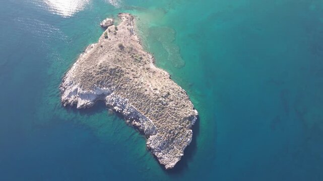 Aerial drone shot.View of famous beach in the summer, Crete, Greece. Famous beach with river and palm trees in Libyan sea. Tropical island, Panoramic view, Most beautiful beaches of Crete island
