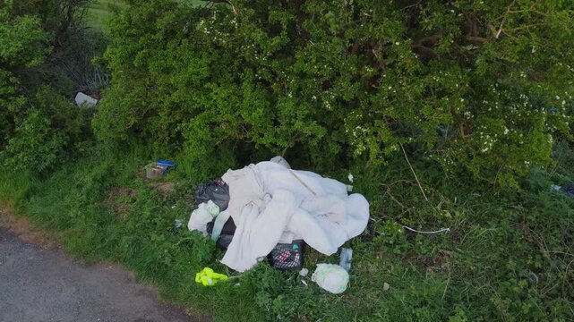 Fly tipping, garbage dumping in UK countryside..