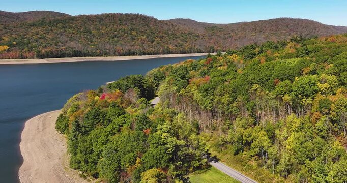 Autumn aerial video of the bridge of the Cannonsville Reservoir, Delaware County, NY, NYC DEP water supply, October 2025.