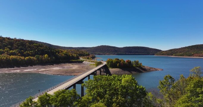 Autumn aerial video of the bridge of the Cannonsville Reservoir, Delaware County, NY, NYC DEP water supply, October 2025.