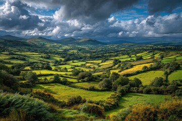 Fototapeta premium Irish Green Fields Patchwork Dramatic Sky Authentic