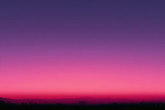 A gradient desert sunset sky, deep pinks and purples, a subtle silhouette of a festival stage at the very bottom, perfect for typography