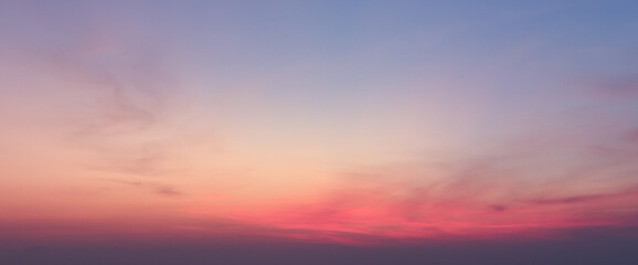 Fototapeta premium Vibrant sunset sky with soft pink and purple clouds over atmospheric horizon for nature background and abstract conceptual design