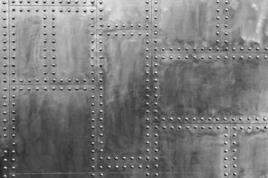 Old steel metal riveted texture as background