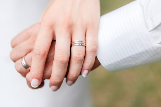 Wedding Rings on Couple Hands Close Up