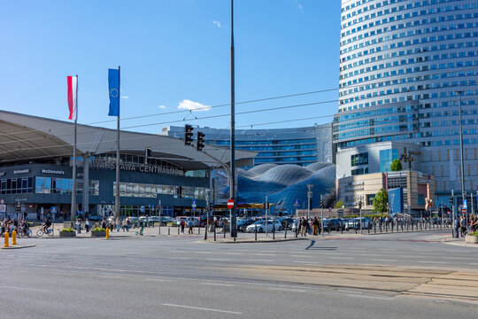 WARSAW, MAZOVIAN VOIVODESHIP, POLAND - MAY 01 2026: A vibrant urban scene featuring the Warszawa Centralna station and Zlote Tarasy shopping center.
