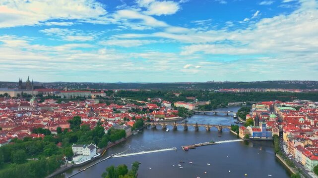 Prague historic bridges above Vltava river. Prague aerial view with Charles Bridge. Prague Charles Bridge districts. Prague cityscape with old architecture.