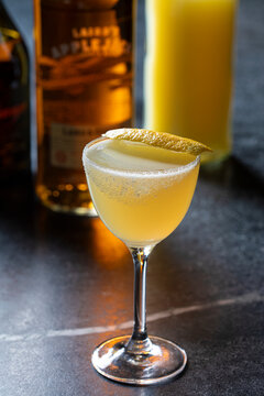 Sidecar cocktail with lemon garnish