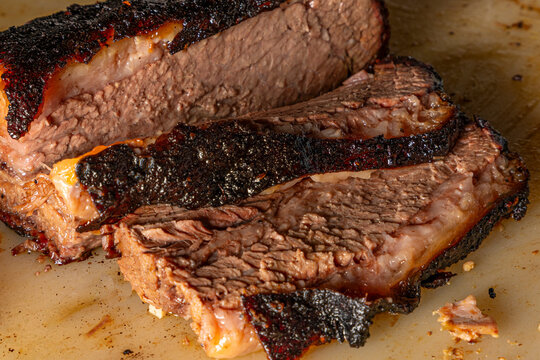 Juicy cut brisket on a platter