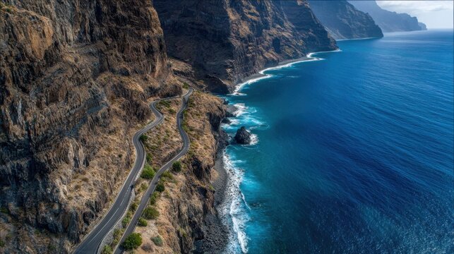 Winding coastal road along dramatic cliffs and blue ocean, scenic seaside landscape, travel adventure route, breathtaking nature destination summer vacation concept
