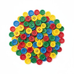 Fototapeta premium Heap of assorted colorful sewing buttons in red yellow green and blue scattered on white surface with multi colored colorful clothing fasteners