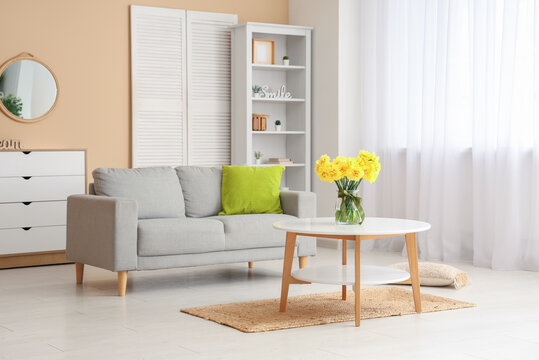 Daffodil flowers in interior of living room
