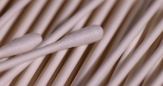 cotton swabs with cotton for hygiene and cosmetics, white paper natural sticks with natural white cotton for makeup correction , injury treatment