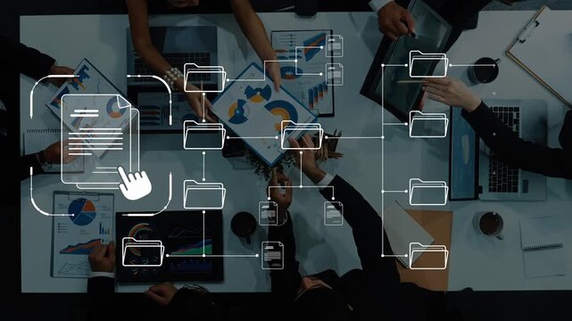 A dynamic business team collaborates in an office setting, analyzing data and reviewing documents displayed on charts. Modern technology enhances their discussions. Raster