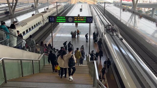 Busy High Speed Train Station Platform in China with Passengers