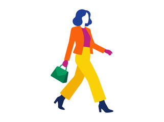 Fototapeta premium Stylish woman in colorful modern outfit walking with a handbag.