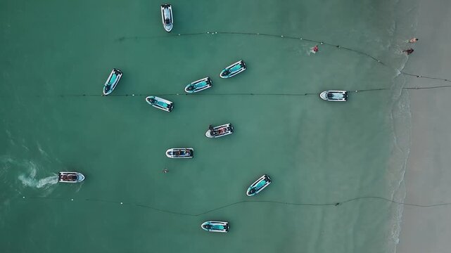 Aerial Video Jet Ski Riders Enjoying Speed and Ocean Waves
