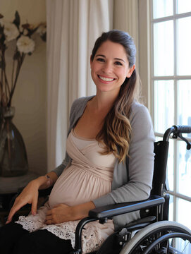 Smiling pregnant woman sitting in a wheelchair inside a cozy and comfortable home.