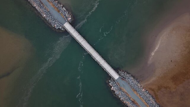 Top View Cinematic Aerial Gravel Road And Wooden Bridge Crossing Marsh Wetland Cole Harbour Heritage Park Halifax Nova Scotia Canada Coastal Landscape Salt Marsh Scenic Nature