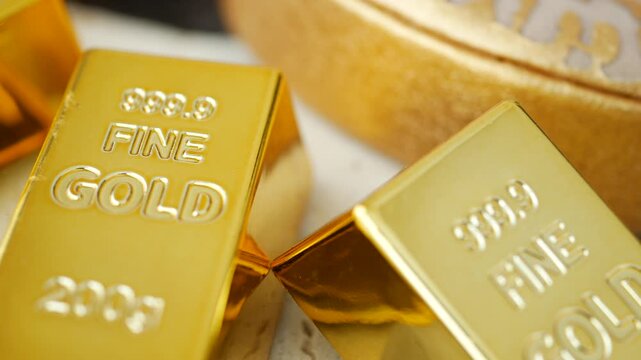 Gold bars shine in close-up display during business hour