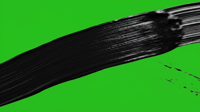 Abstract black paint strokes on green screen. Artistic brush wipe transition for creative video editing.