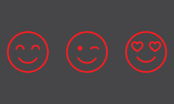 Red illustration icon of a smiley face.