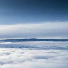 Naklejka premium White clouds and blue sky filling the frame over distant snowy mountain peaks for travel background, airline advertising and winter nature website styling