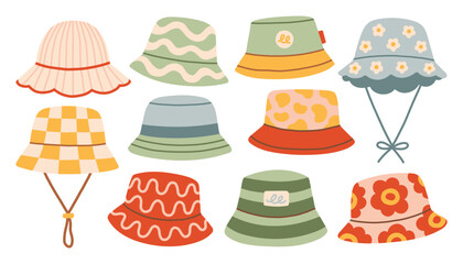 Collection of hand drawn cotton bucket hats and sun hats. Minimalist flat vector illustration of trendy summer headwear with floral, checkered, and wavy patterns for vacation. Isolated on white © spirka.art