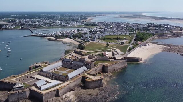 Drone reveal of Port-Louis citadel and Brittany coastline France