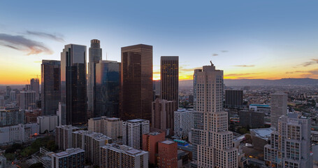 Fototapeta premium Los Angeles cityscape financial district architecture. Los Angeles modern urban towers buildings. Los Angeles aerial panorama California city. Los Angeles business center towers.