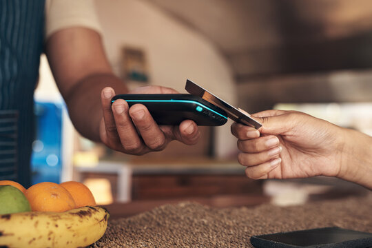 Payment, pos machine or hands with credit card in restaurant, electronic money transfer or tapping. Digital transaction, waiter or customer with fintech for purchase, nfc bill settlement or people
