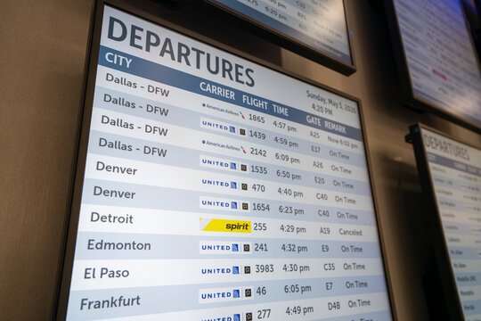 Houston, TX, USA - May 3, 2026: The Spirit Airlines flight NK255 from Houston (IAH) to Detroit (DTW) is seen canceled on the screen of a departure board at George Bush International Airport.