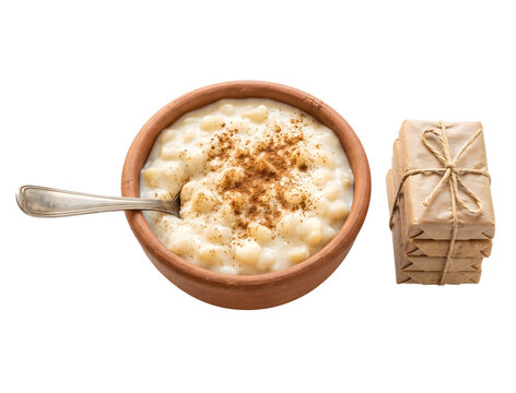 Traditional Brazilian Canjica White Corn Pudding Cinnamon Topping Clay Bowl Silver Spoon Stacked Pa&ccedil;oca Peanut Candy Twine Wrapped Top View Festa Junina Food Isolated Transparent Background