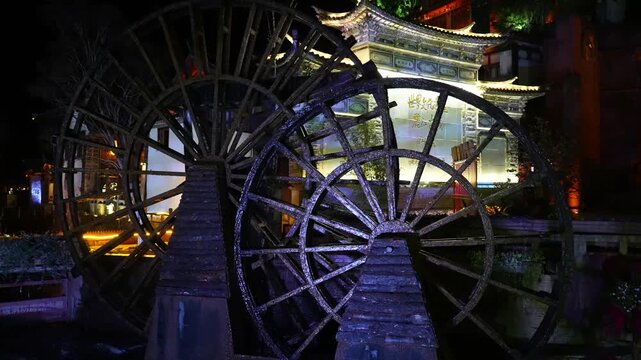 Illuminated Water Wheels at Night in Lijiang Old Town China