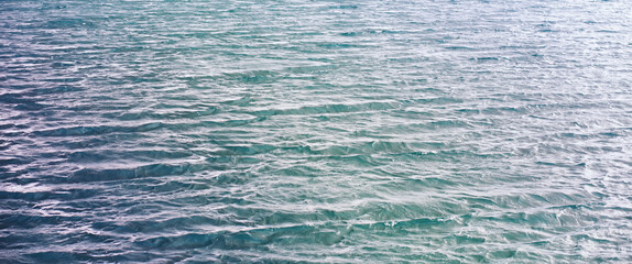 Obraz premium Water surface. The texture of the water. Waves on the lake in windy weather.