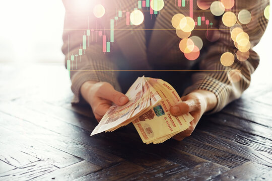 Woman counts money. female hands hold cash banknotes denominations of 5000 rubles currency. business woman rich female hands hold and count, pay cash banknotes ruble or paper banknotes
